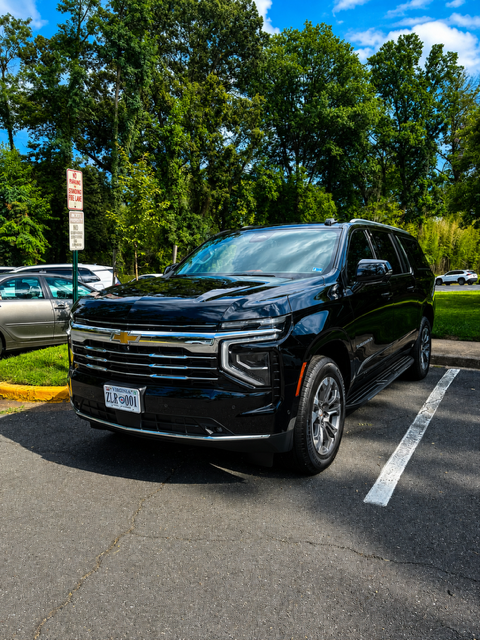 Black Chevrolet Tahoe with clean, glossy paint after a full exterior detail